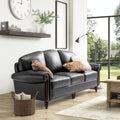 Dietmar Genuine Leather Sofa – Black Curved Leather Nailhead Sofa